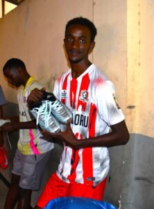 kid with new boots